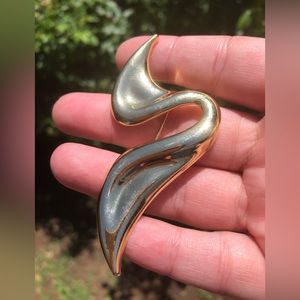 Gold abstract brooch